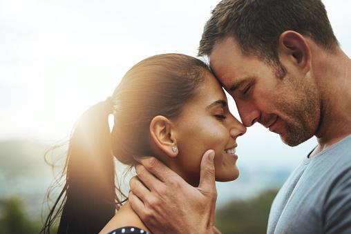 couple looking into each other's eyes